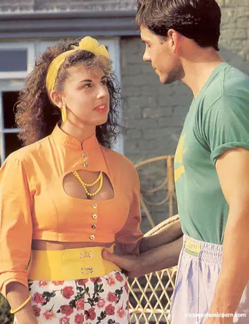 Curly-Haired Brunette Enjoys Vintage Threesome
