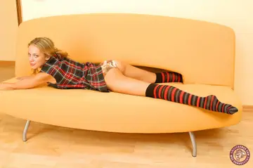 European Blonde Strips Off Her Socks and Fingers Her Hairy Pussy
