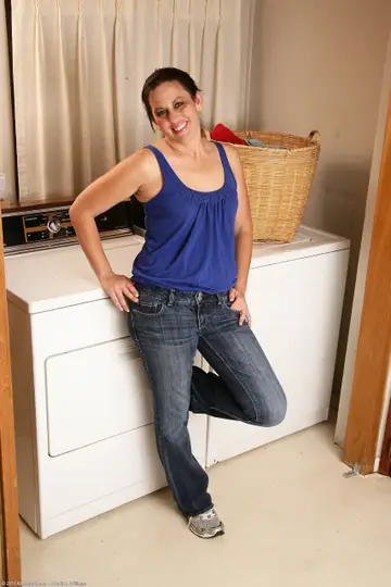 Chubby Mature Woman Strips Out of Her Jeans in Laundry Room