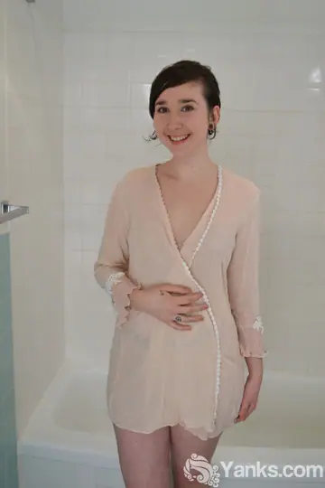 Hairy Brunette Shows Her Big Ass and Fingers Her Pussy in the Bathroom