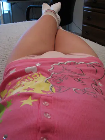 Brunette in Panties and Socks Spreads on the Bed
