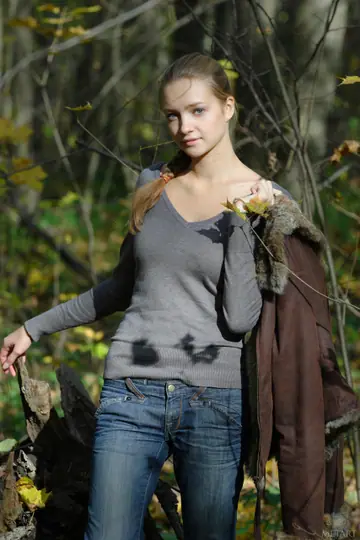Woman in Pigtails Strips Out of Her Jeans in the Woods