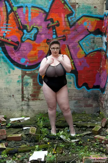 Georgina Gee – BBW Brunette Unleashes Her Big Tits Near Graffiti Outdoors