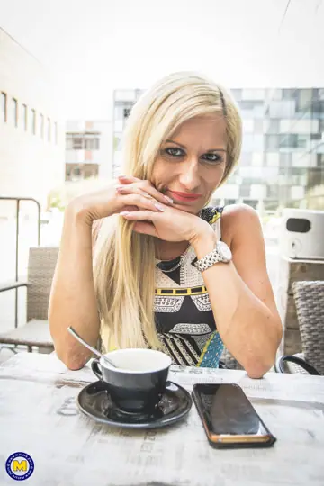 Mature European Blonde Strips Out of Her Skirt Outdoors in Stockings