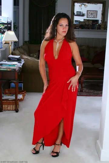 Busty Brunette MILF Strips Out of Her Red Dress and Spreads Her Legs in Heels