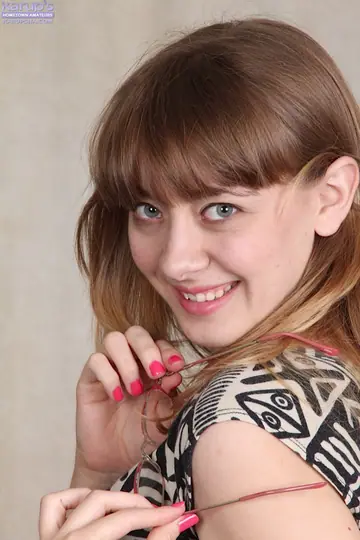 Clara D – Amateur Redhead Lifts Her Dress and Spreads Her Hairy Pussy