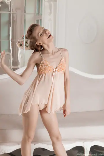 Dennie – Slim Redhead Sheds Her Lingerie, Keeps Heels, Fingers Her Hairy Pussy