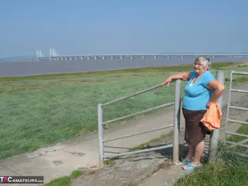 BBW Blonde Poses Nude on a Bike Path