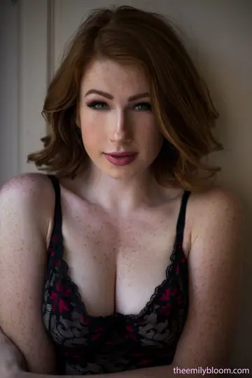 Busty Redhead Spreads Her Pussy by the Window