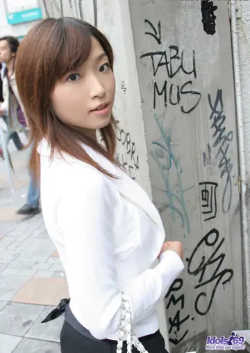 Japanese Brunette Lifts Her Skirt and Spreads at a Public Toilet