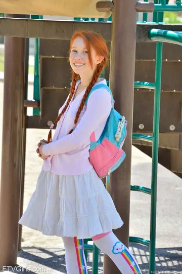 Skinny Redhead in Uniform Toys Her Pussy Outdoors