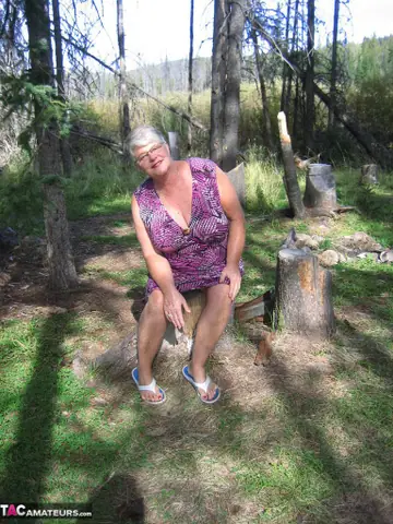 BBW in Glasses Strips Nude in the Forest