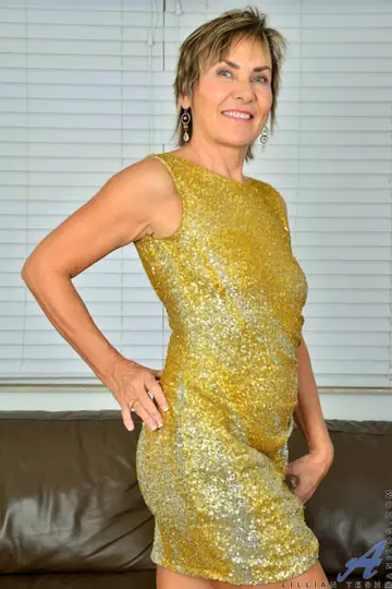 Lillian Tesh – Short-Haired Mature Woman Strips Her Dress to Show Her Big Tits