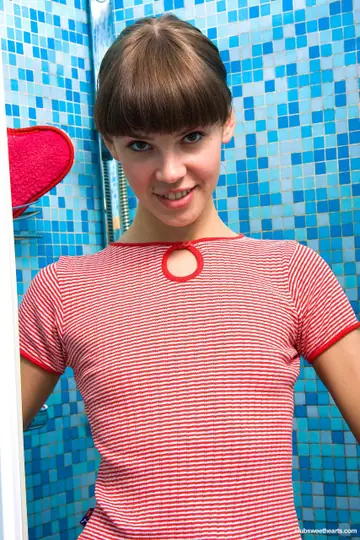 Skinny Brunette Shows Her Small Tits and Big Ass in the Bathroom