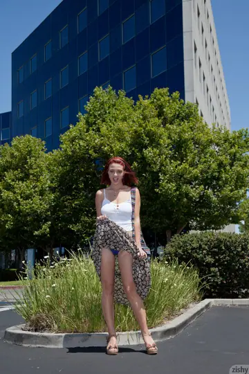 Redhead with Short Hair Shows Her Big Natural Tits Outdoors