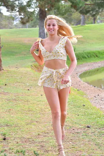 Blonde in Shorts Spreads Her Legs in the Forest