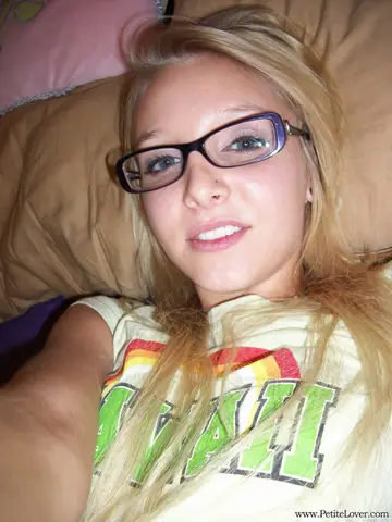Elle Blue – Blonde with Big Tits Spreads in Glasses and Shorts