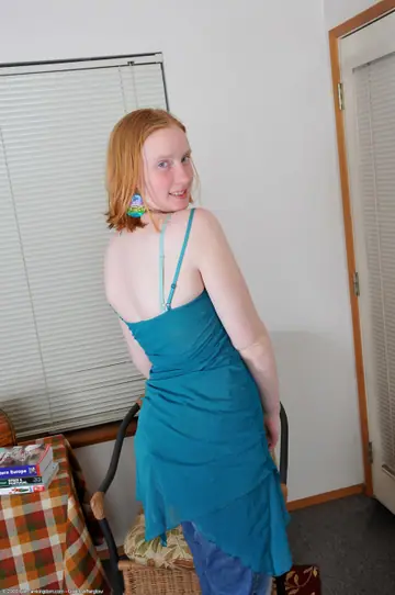 Redhead with Short Hair Fingers Her Hairy Bush