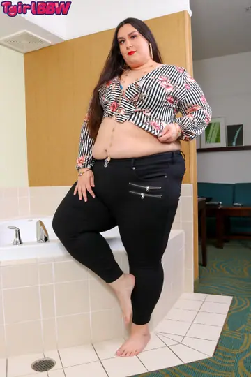 Curvy Trans Woman Strips Nude and Poses