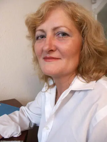 Mature Redhead Spreads in the Office
