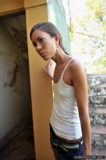 Skinny Brunette Strips Out of Her Denim Shorts and Spreads