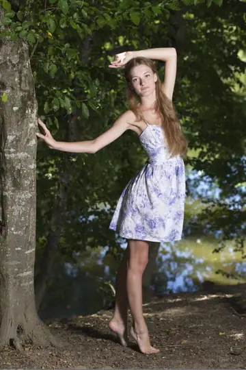 Skinny Redhead Strips Out of Her Skirt and Spreads Outdoors