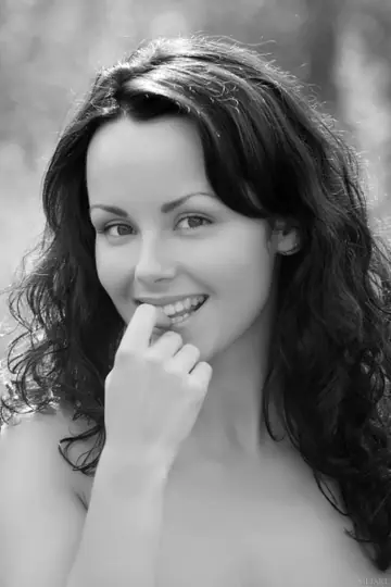 Mirelle A – Curly Brunette with Big Natural Tits Shows Her Hairy Bush in the Forest