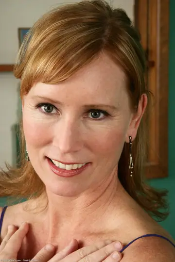 Mature Redhead MILF Undresses and Spreads Her Pussy Wide