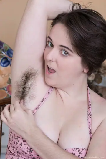 Thick Amateur Undresses and Spreads Her Hairy Bush