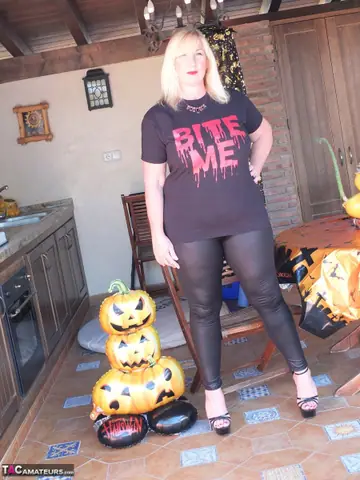 Curvy Mature Blonde Strips Out of Her Yoga Pants to Show Thong