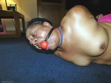 Curvy Mature Ebony Woman Endures Strict Hogtie and Ball Gag