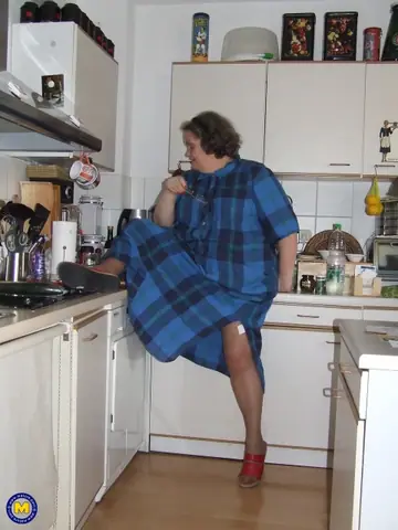Birgid – Busty Curvy Mature Woman Masturbates with a Cucumber on the Kitchen Counter