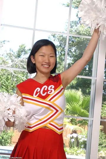 Korean Brunette in Uniform Reveals Her Big Natural Tits and Hairy Pussy