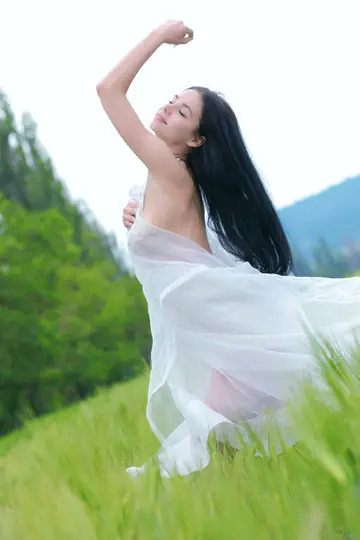 Leona E – Tall Ukrainian Brunette Undresses Outdoors in a Sheer Dress
