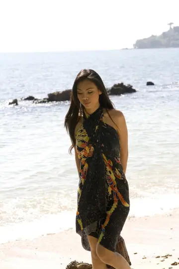 Asian Brunette with Big Tits Exposes Her Breasts in a Dress Outdoors
