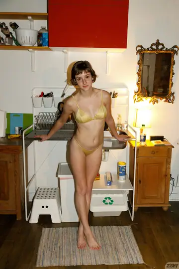 Amateur with Short Hair Poses Nude in the Forest and Bathroom