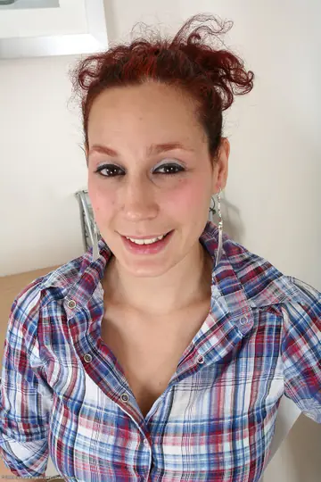 Busty Redhead MILF Strips to Reveal Her Hairy Pussy