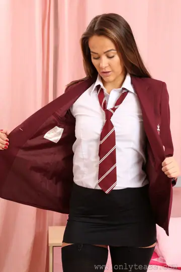 Felicity Hill – Brunette in Stockings and Uniform Teases Her Ass