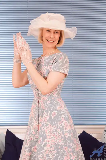Hazel May – Blonde MILF Strips Off Her Dress and Fingers Her Trimmed Pussy with a Cucumber