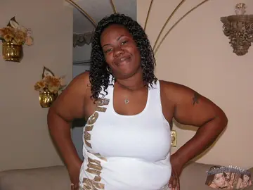 Curvy Ebony MILF Undresses and Fingers Her Pussy