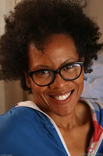Mature Ebony Woman in Lingerie and Glasses Spreads Her Hairy Pussy