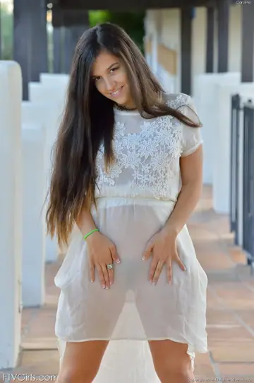 Busty Woman Lifts Her Dress to Finger Her Hairy Pussy with Banana