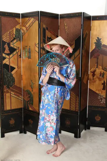 Petite Redhead MILF Strips Out of Kimono and Corset to Masturbate