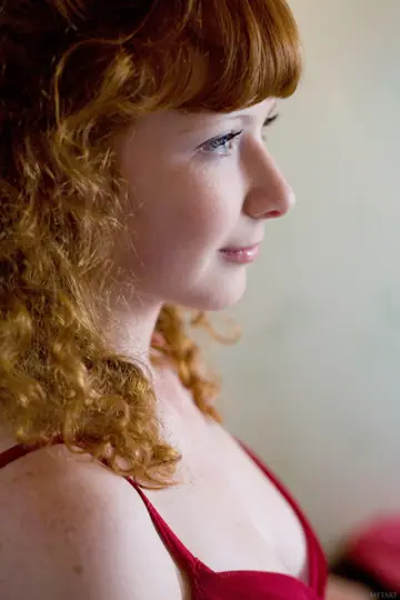 Curly Redhead Spreads Her Pussy in White Stockings