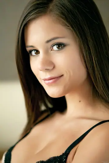 Petite Brunette Poses Naked on a Leather Sofa