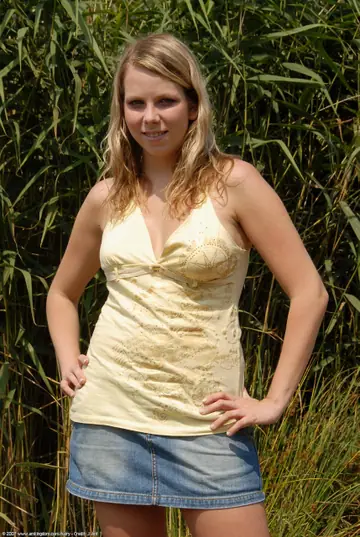Blonde Babe Undresses Outdoors and Spreads Her Hairy Pussy