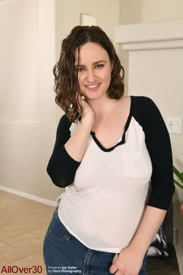 Jay Taylor – Redhead MILF Peels Off Her Top and Reveals Her Trimmed Pussy