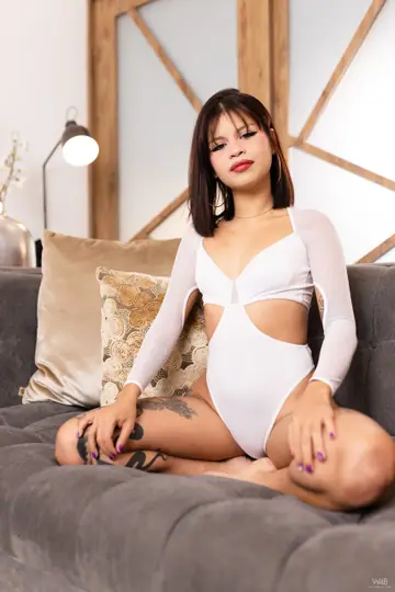 Latina in a Bodysuit Strips and Toys Her Pussy