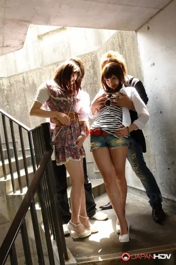 Brunette Asian Women Give Blowjobs and Handjobs on Outdoor Stairs