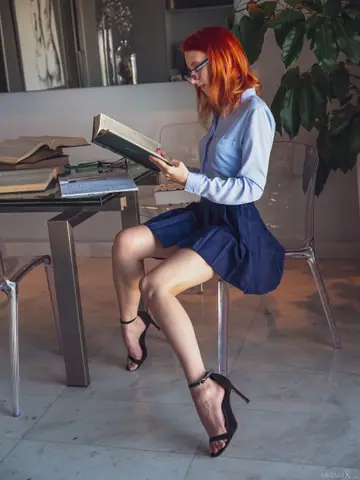 Elin Dane – Skinny Redhead Strips Out of Her Skirt and Fingers Her Pussy